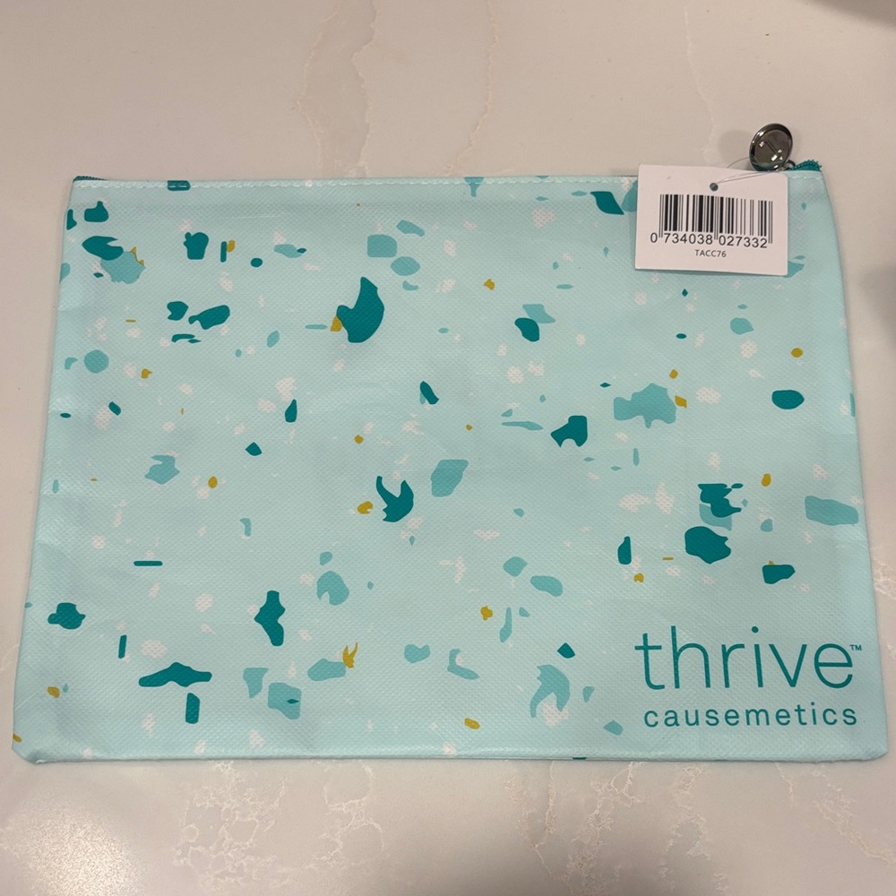 Thrive Causemetics Aqua Speckled Pouch